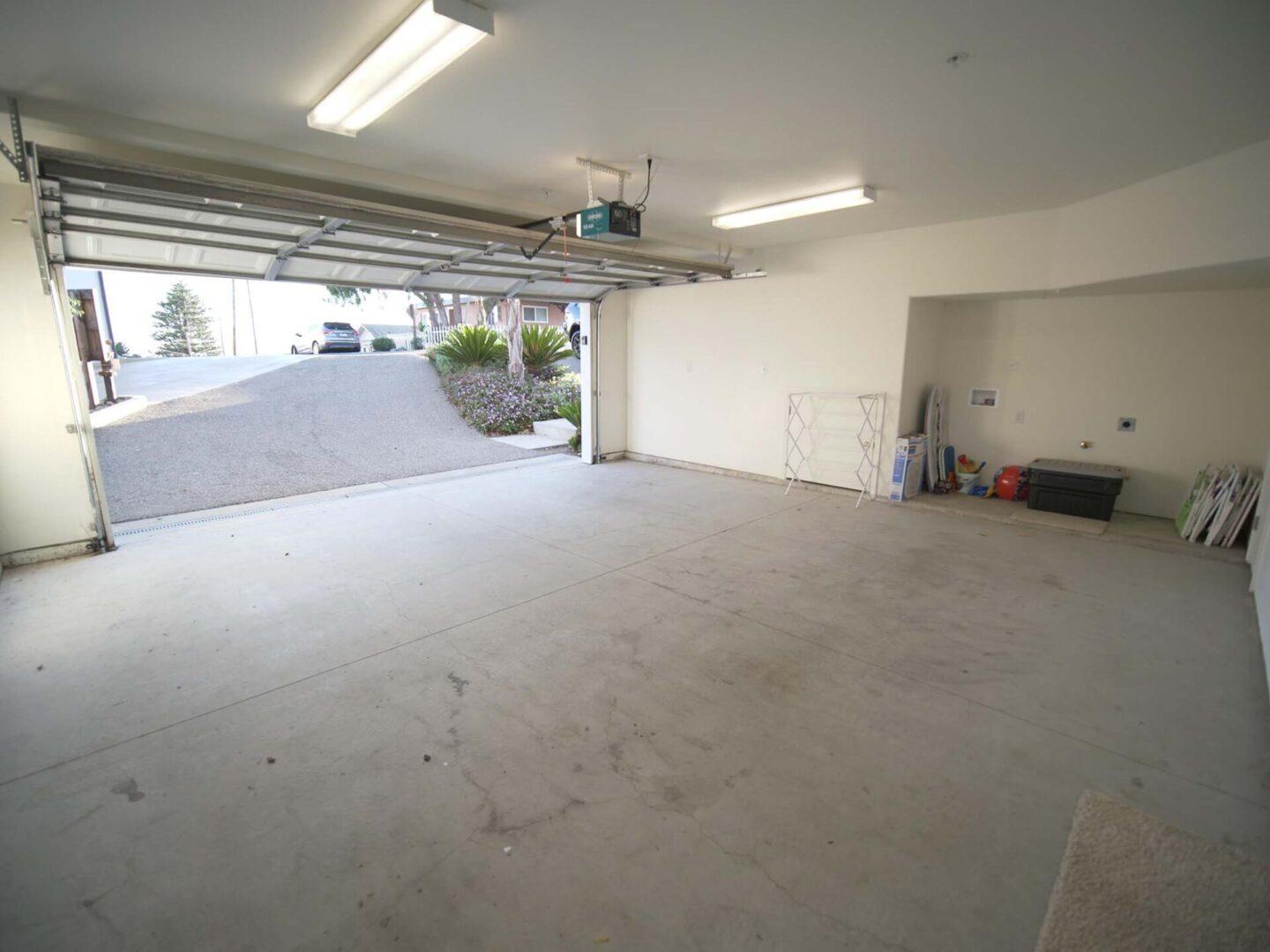 A garage with concrete floors and walls.